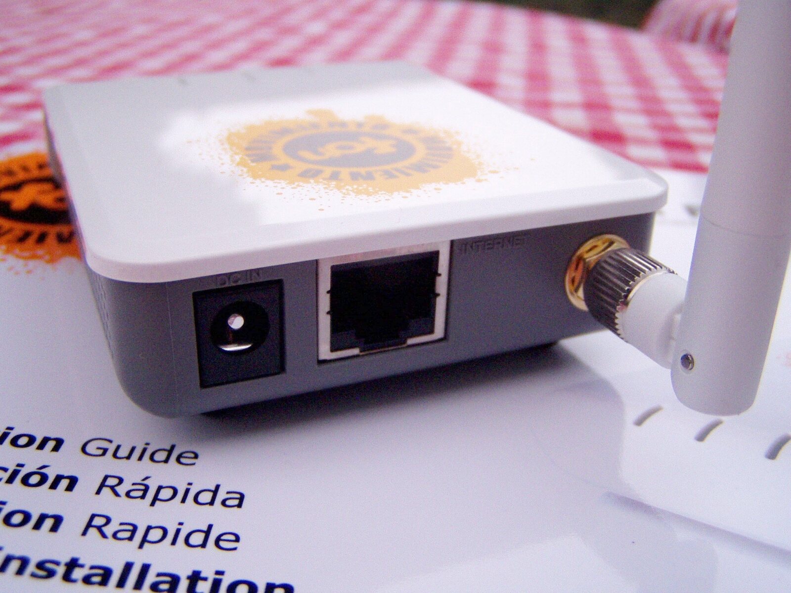 The rear of a real wireless router showing its Ethernet port